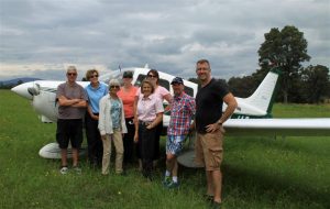 The Curtis Aviation fly-away team on the receiving end of a warm welcome at Frogs Hollow airfield.