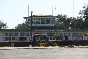 ATC Tower and bougainvillea-laden terminal at Kariba airport, Zimbabwe. Customs & immigration, here we go again