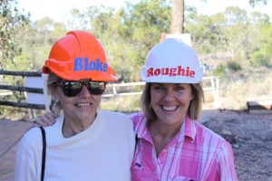 Sisters get into the swing of things as only die hard Lightning Ridge miners can.