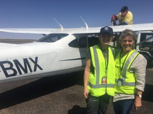 With Curtis Aviation pilot Christine Wright at Alice Springs