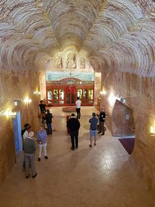 Join a tour or drive yourself to see some incredible examples of underground church architecture in the town. 